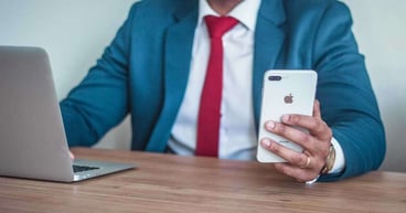 phone-laptop-vishing-corporate_1200x630_og_compressed